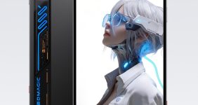 Black RedMagic gaming smartphone angled in icy blue environment, showcasing its side cooling vent with blue LED accents.
