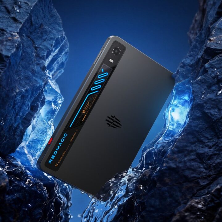 1000042776 Black RedMagic gaming smartphone angled in icy blue environment, showcasing its side cooling vent with blue LED accents.