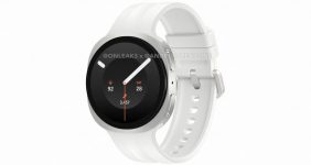 Round smartwatch with an olive-green band and metal bezel, displaying time and activity stats on a dark circular screen.