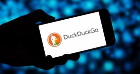 Dark brown app settings panel showing Ad Blocking enabled, with YouTube block options and a DuckDuckGo/Duck Player section on a yellow background.